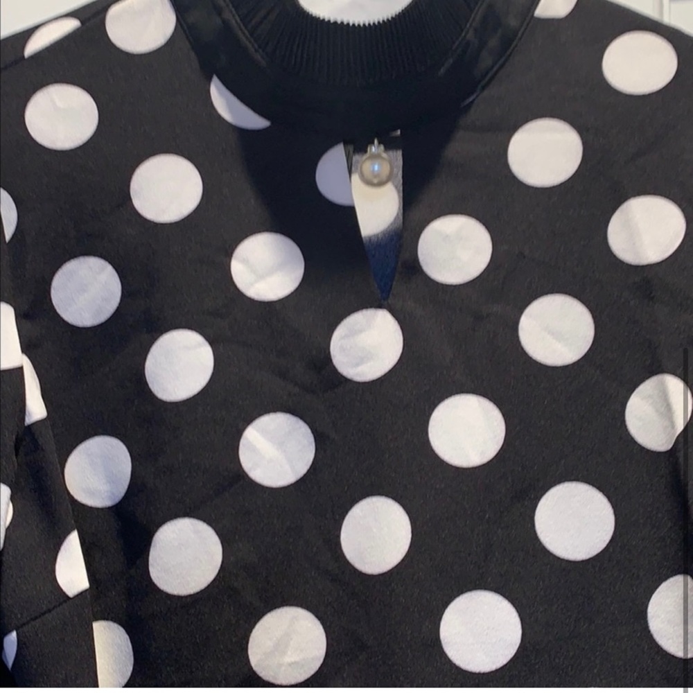 Gracia top with pearl accent on neck with bell sleeves